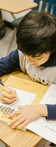 Children in a classroom writing