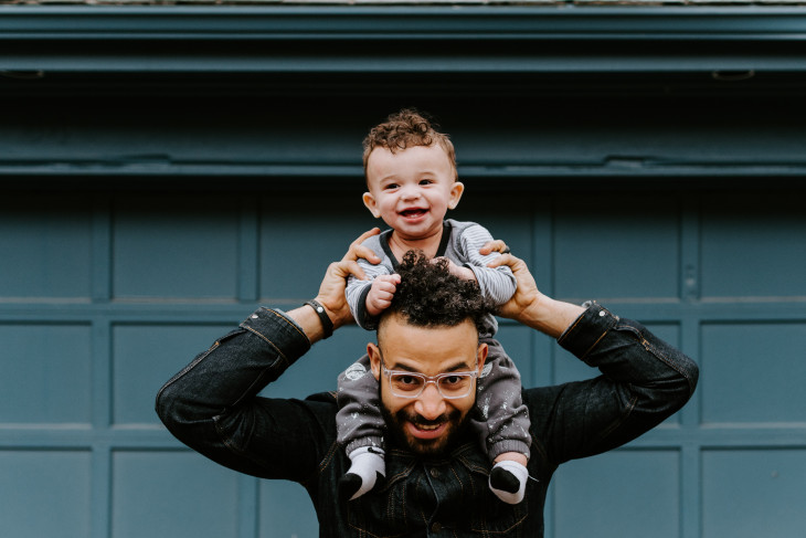 Man with toddler on his shoulders